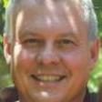 Headshot of Randy Consford a white male in a maroon shirt