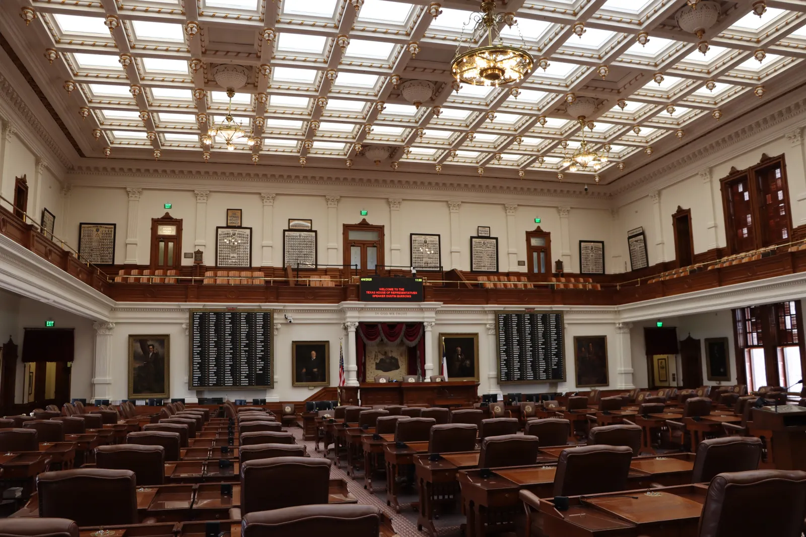 Either Texas House or Senate chamber. Lots of seating and is empty.