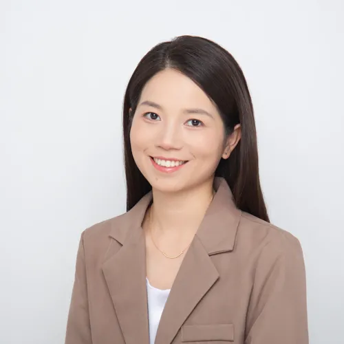 Jinlan, long dark straight hair, dark eyes, small smile with dimples